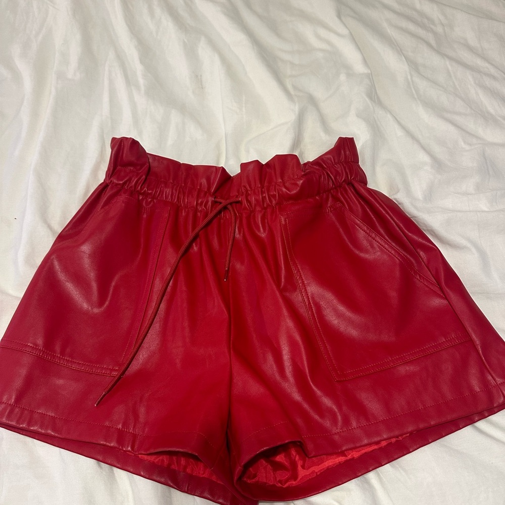 Red leather shorts from HEMLINE Dallas